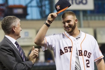 Houston Astros second round draft pick A.J. Reed tips his cap as he is introduced to the fans at Minute Maid Park Wednesday, June 11, 2014, in Houston. ( Brett Coomer / Houston Chronicle )
