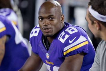 Aug 8, 2014; Minneapolis, MN, USA; Minnesota Vikings running back Adrian Peterson (28) talks along the sidelines during the game with the Oakland Raiders at TCF Bank Stadium. Vikings win 10-6. Mandatory Credit: Bruce Kluckhohn-USA TODAY Sports