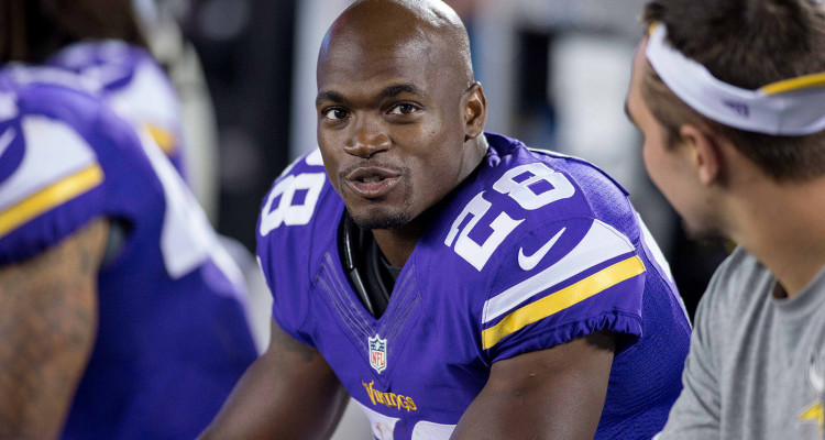 Aug 8, 2014; Minneapolis, MN, USA; Minnesota Vikings running back Adrian Peterson (28) talks along the sidelines during the game with the Oakland Raiders at TCF Bank Stadium. Vikings win 10-6. Mandatory Credit: Bruce Kluckhohn-USA TODAY Sports