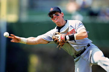 2 May 2000:   Craig Biggio #7 of the Houston Astros tosses the ball during the game against the Chicago Cubs at Wrigley Field in Chicago, Illinois.  The Cubs defeated the Astros 4-3.Mandatory Credit: Harry How  /Allsport